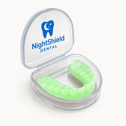 Green night guard in a clear Night Shield Dental case on a white background