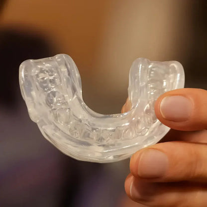 Night Shield Dental Custom Mouldable Sleep Apnea guard Mandibular Advancement Device held by customer